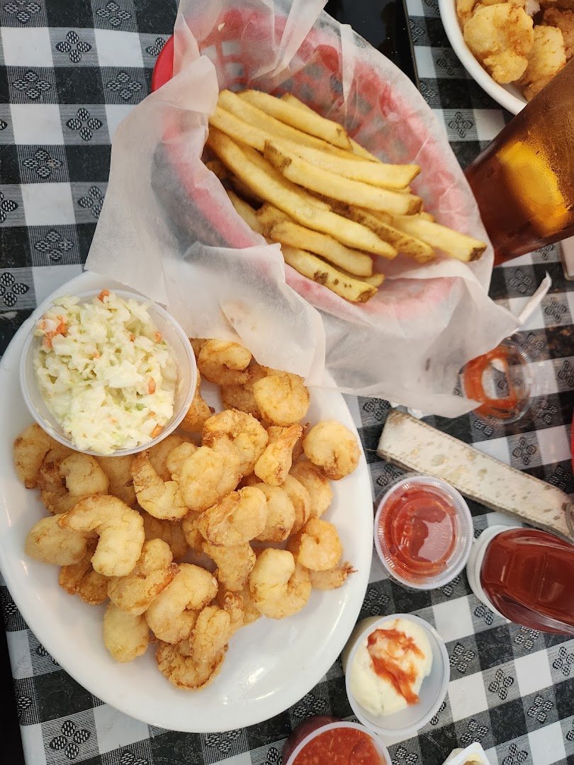 Hearty seafood plates in a cozy dining room.