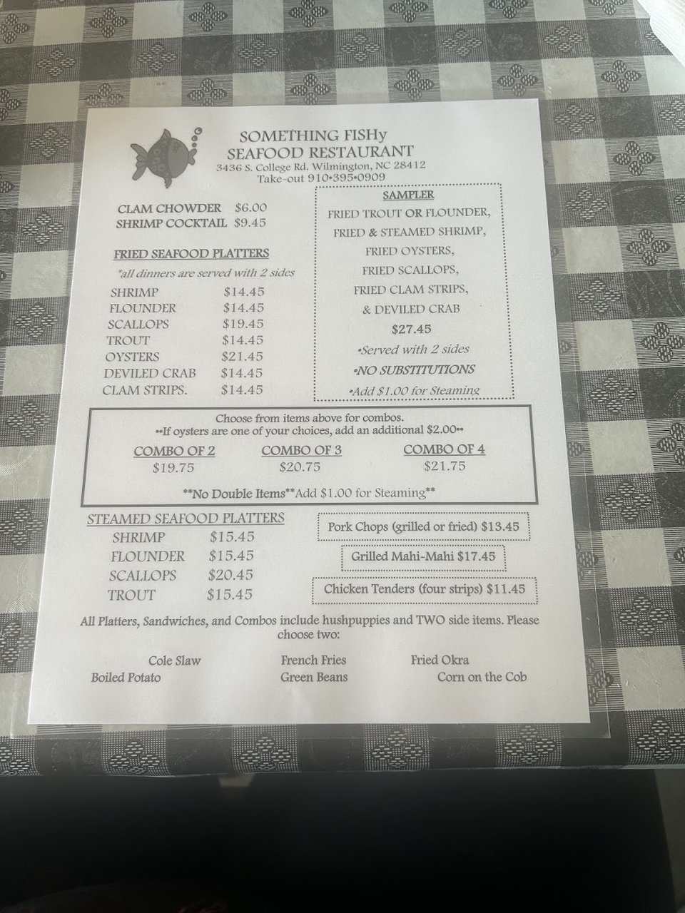 Seafood menu featuring shrimp, flounder, and oysters.
